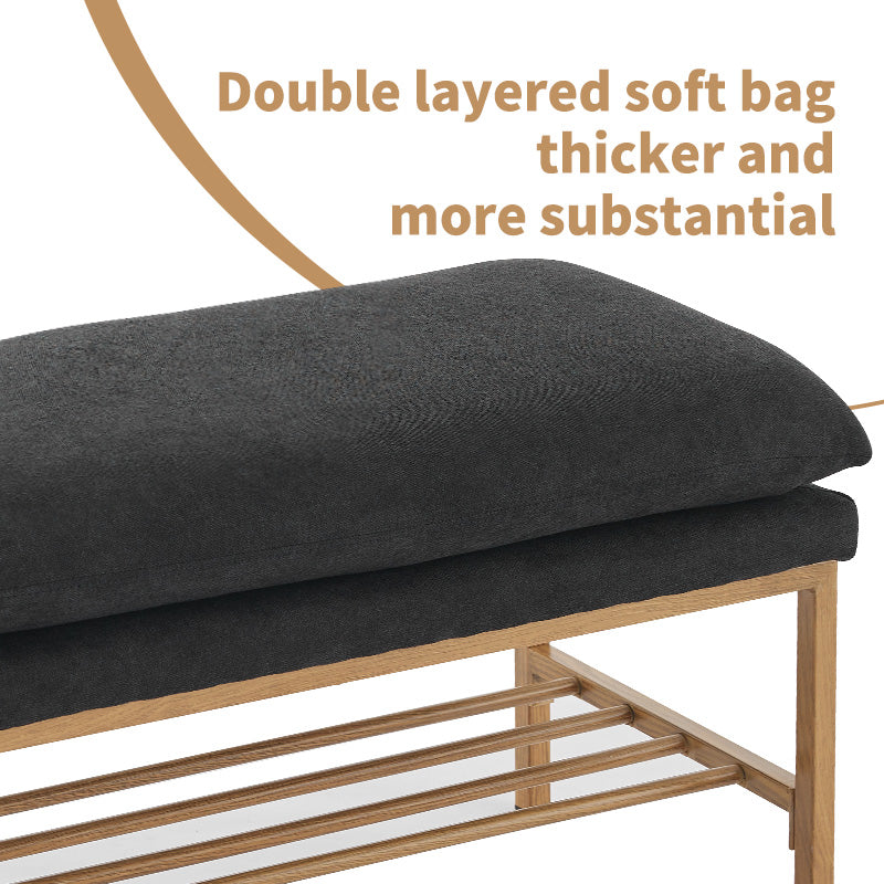 Dark gray upholstered shoe bench with doublelayered cushioning for comfort