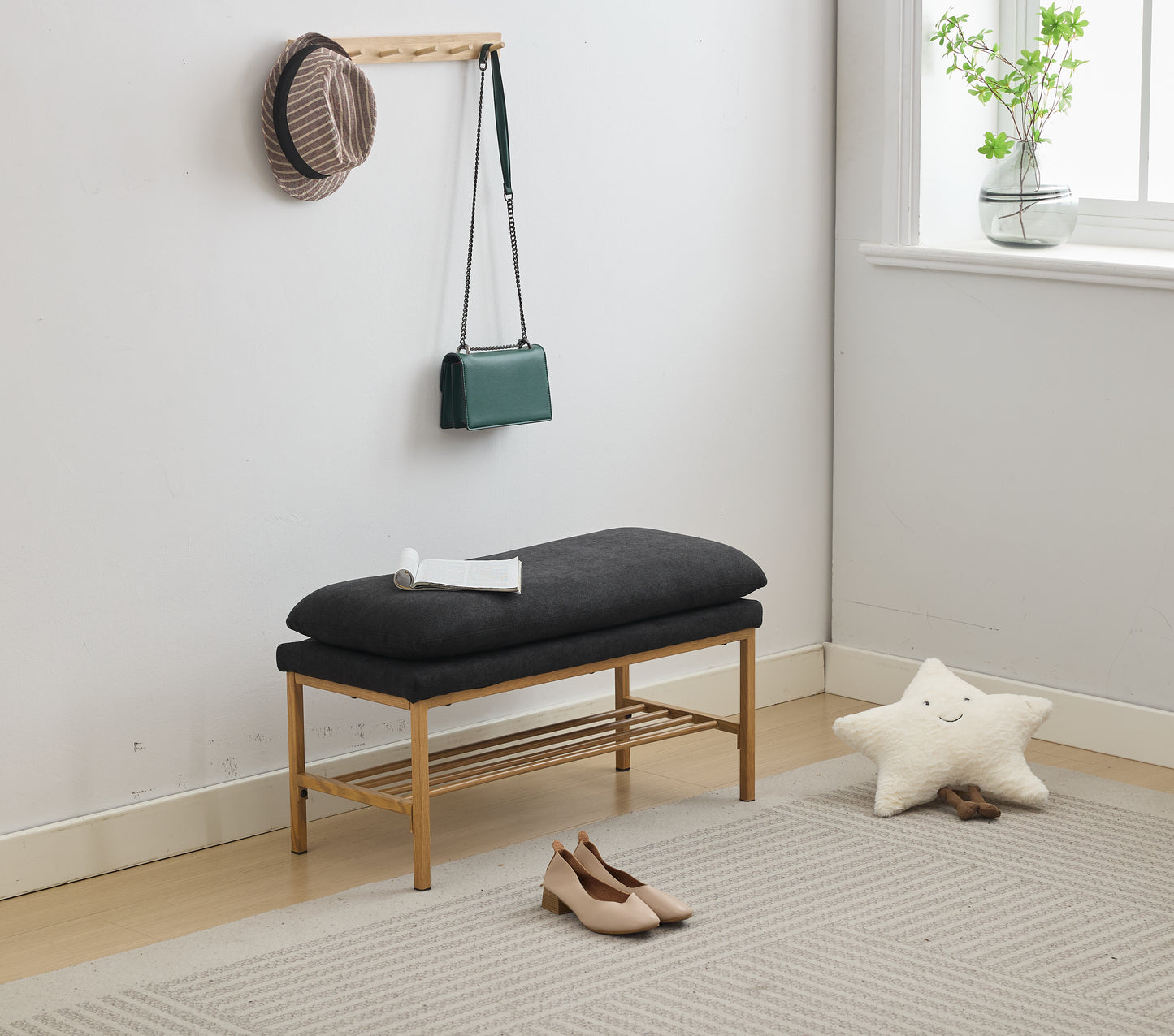Dark gray upholstered entryway bench with wooden frame and shoe rack