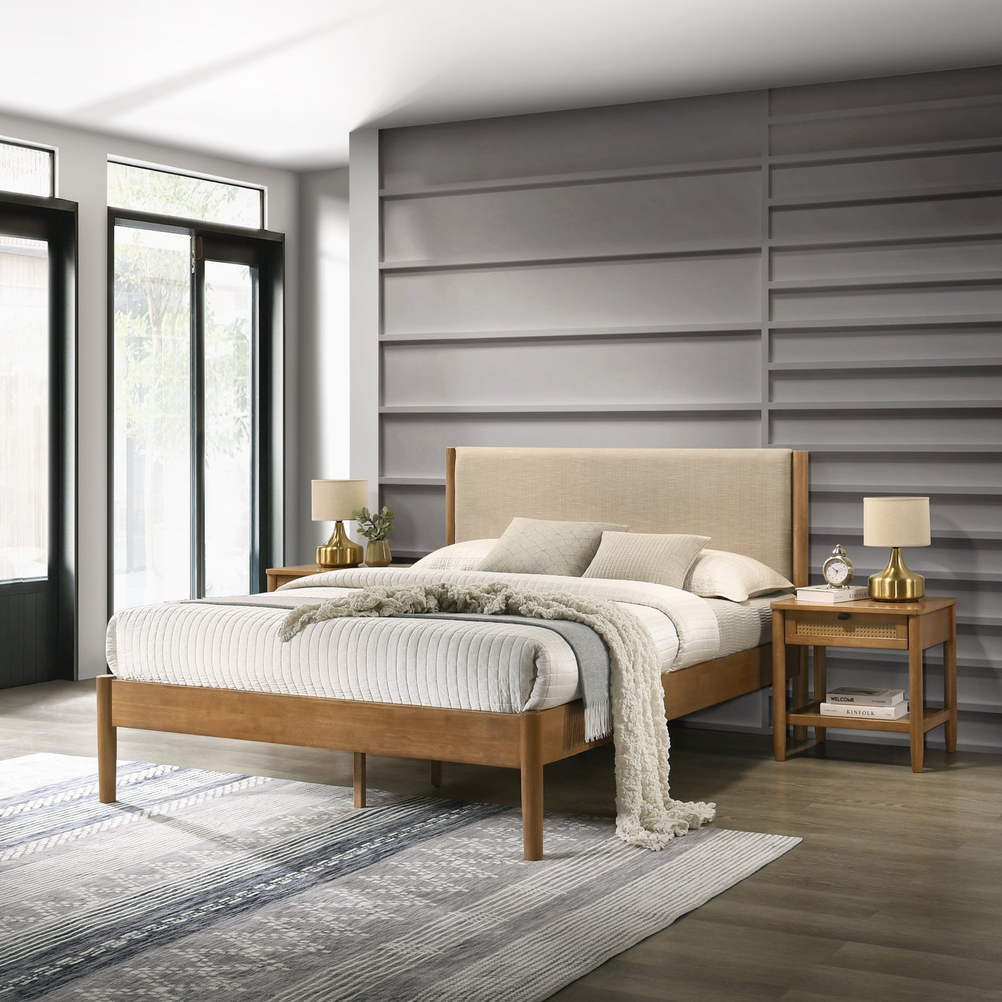 Queen size wooden bed frame with beige upholstered headboard and white bedding