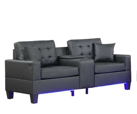 Black faux leather loveseat with tufted back and builtin cup holders illuminated by blue LED lights