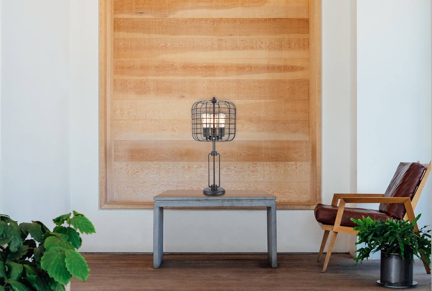 Industrial cage table lamp with exposed bulbs and black metal finish