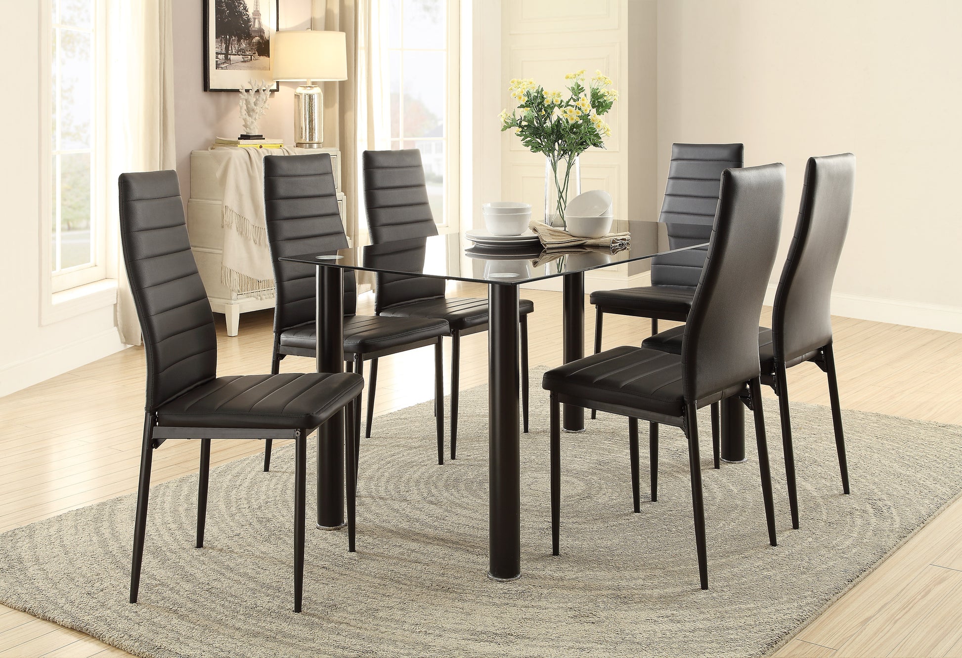 Modern dining set with a sleek glass top table and six black faux leather chairs
