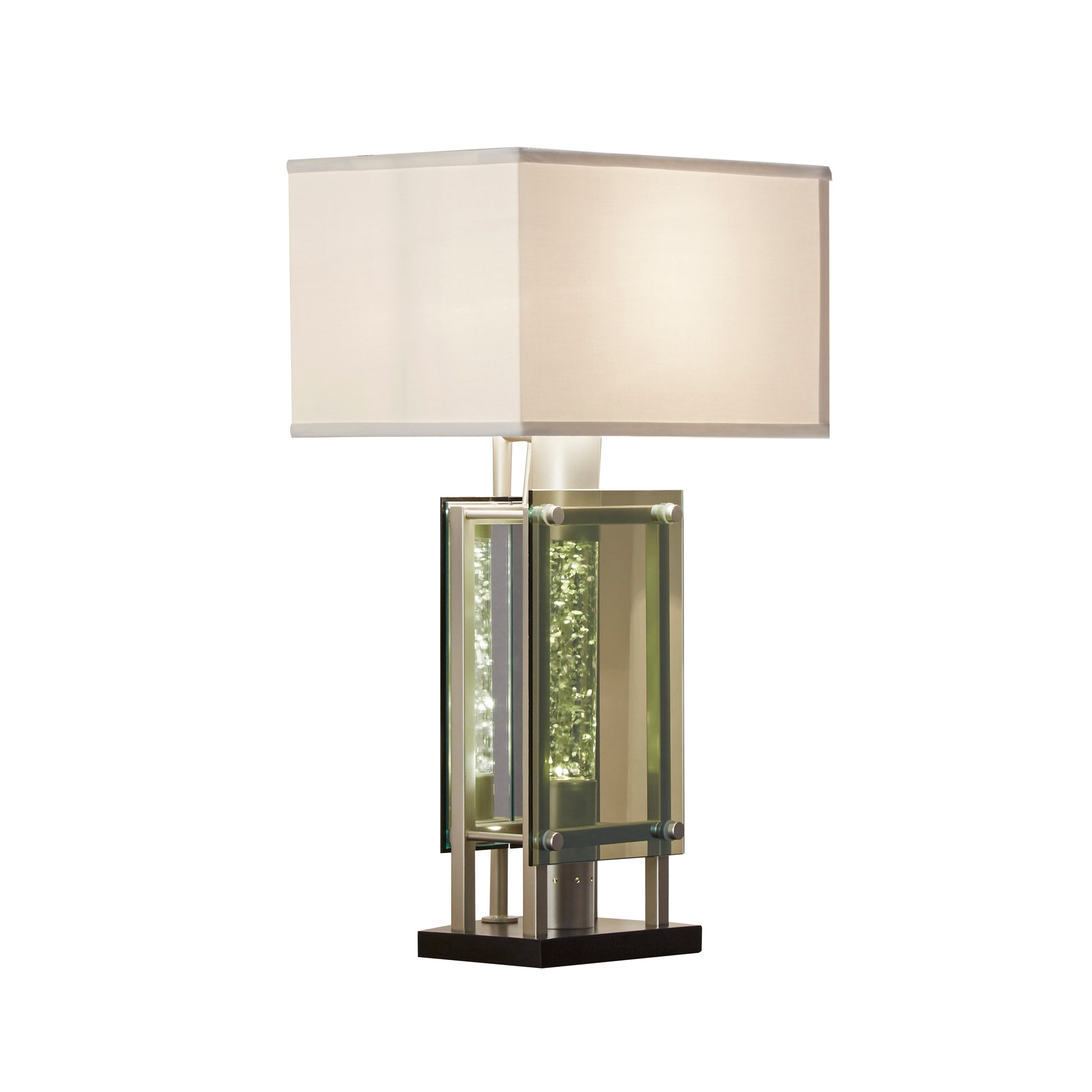 Modern table lamp with a rectangular cream shade and a stacked glass and metal base