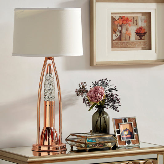 Rose gold table lamp with glitterfilled column and cream shade bedside lighting option