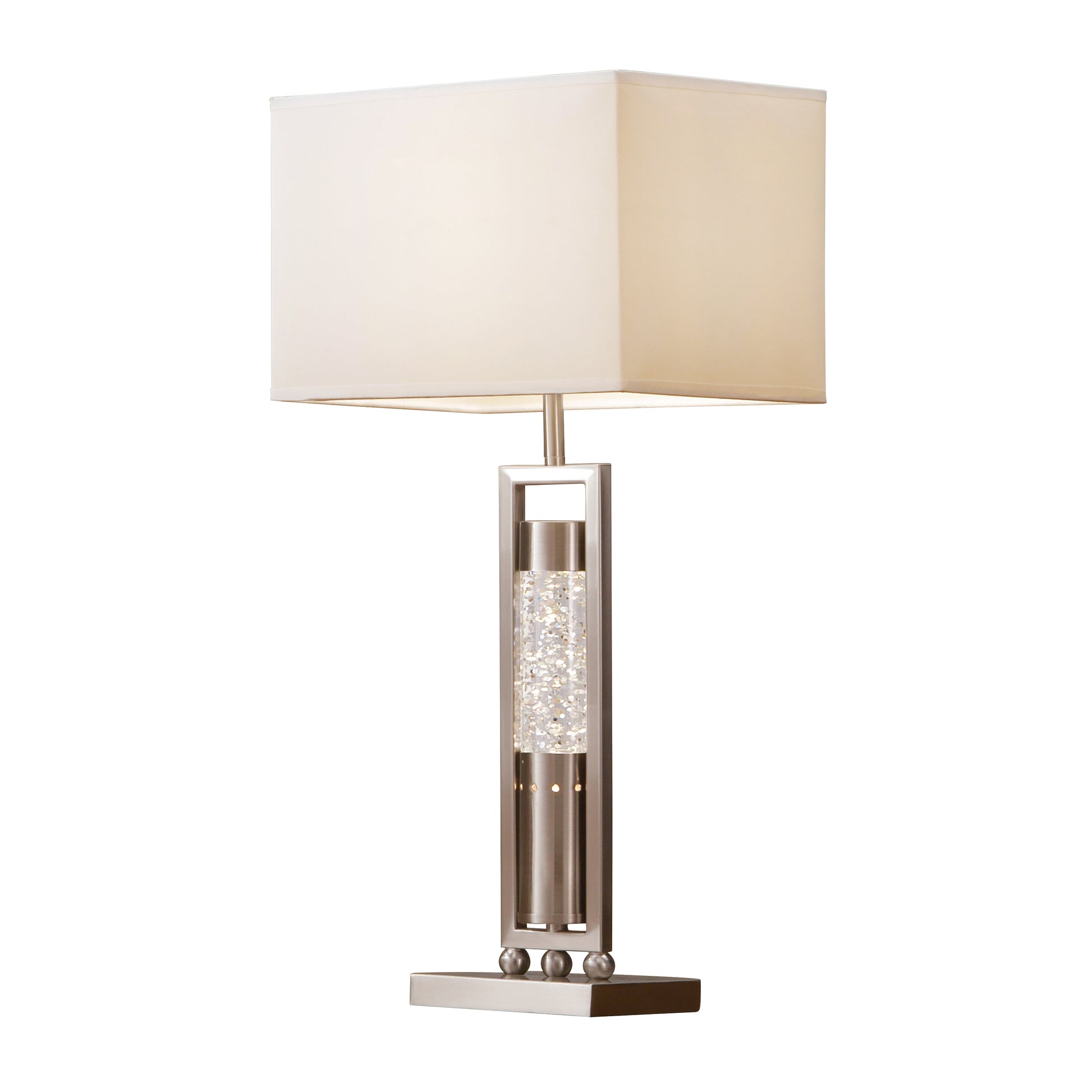 Modern silver table lamp with a rectangular cream shade and a clear glass column filled with iridescent accents