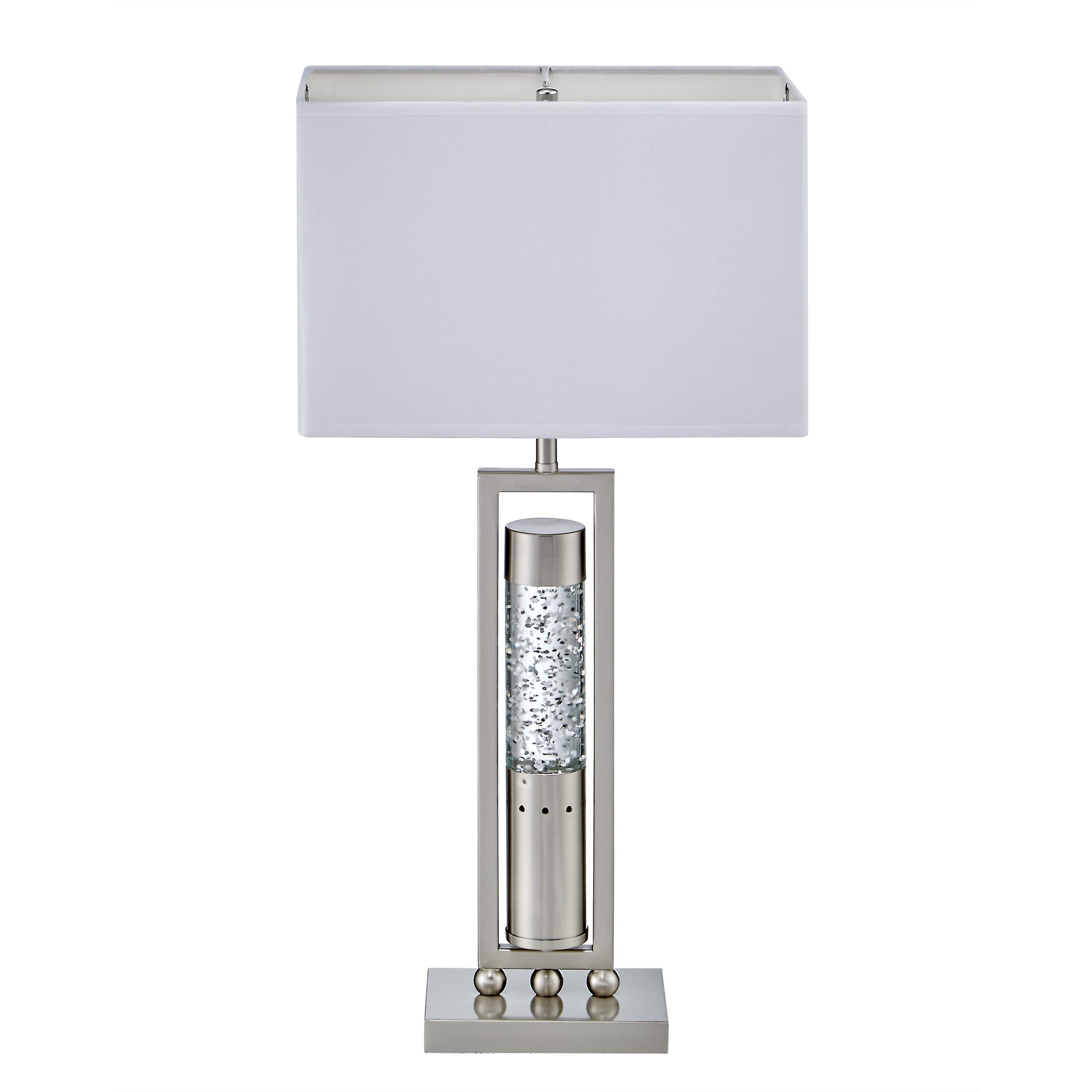 Modern brushed nickel table lamp with clear cylinder filled with silver accents