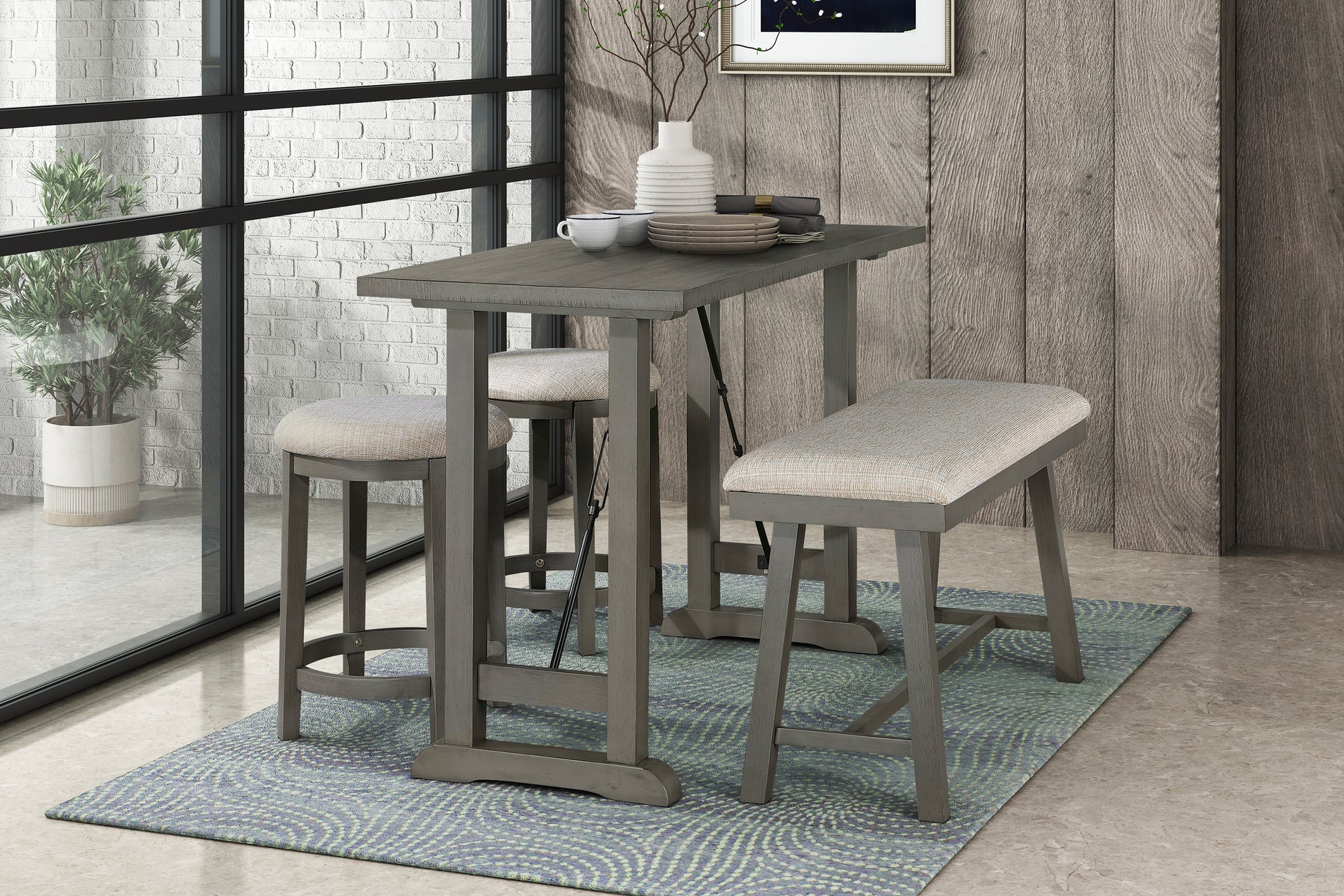 Gray wood pub table with two fabric upholstered stools