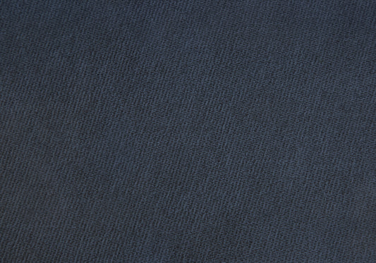 Closeup of textured dark navy fabric swatch ideal for upholstery or apparel