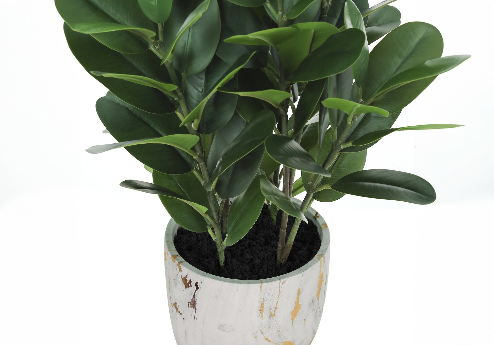 Realistic faux rubber plant with glossy dark green leaves in a textured white and gold pot