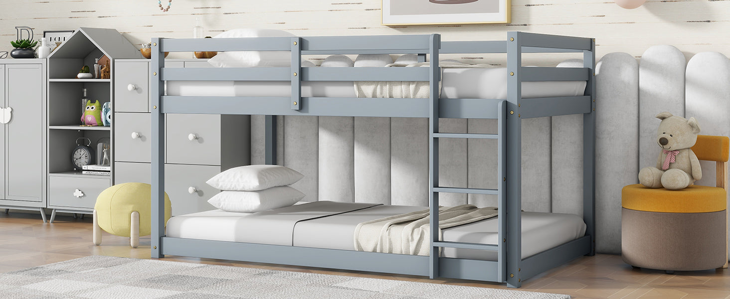 Gray wooden twin bunk bed with ladder and white bedding
