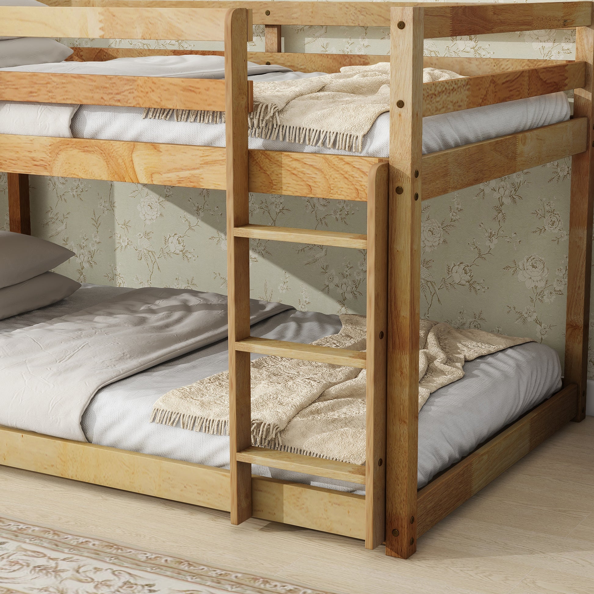 Natural wood twin bunk bed with ladder and blankets
