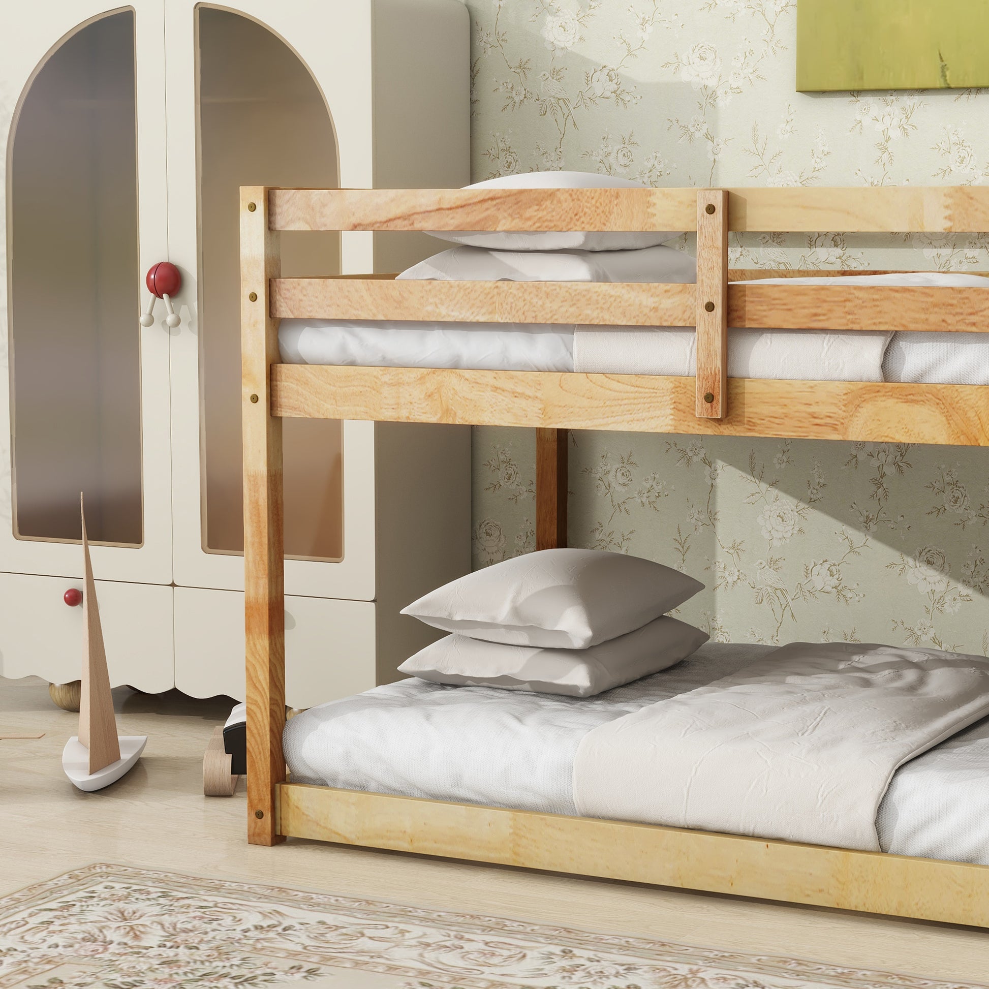 Natural wood twin bunk bed with white bedding and pillows