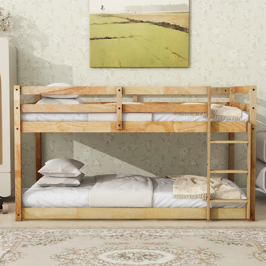 Natural pine wood bunk bed with white linens and a textured throw blanket