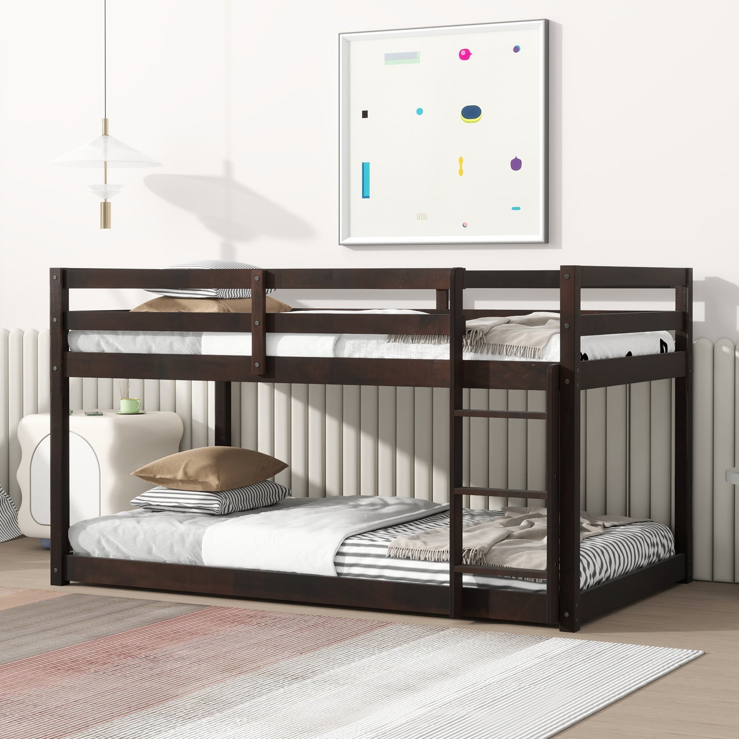 Dark brown wooden bunk bed with white linens and striped blankets