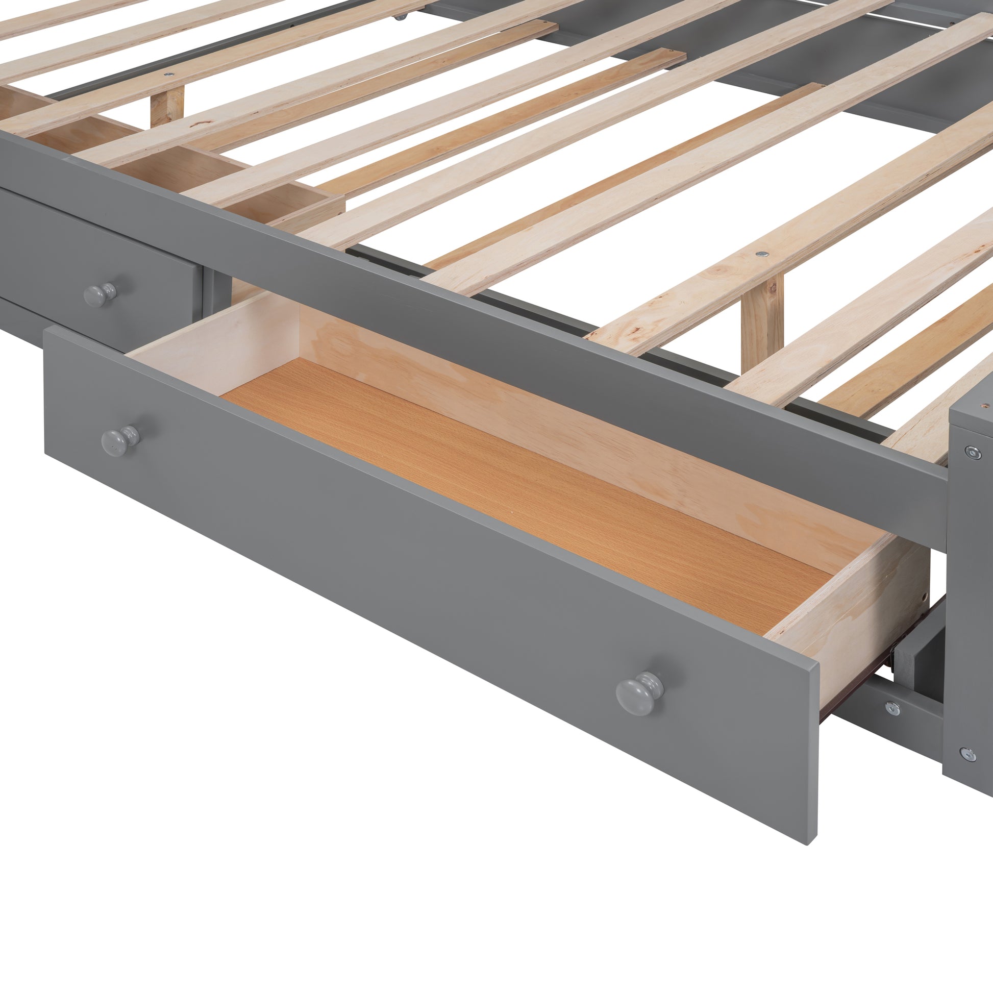 Grey wooden twin bed frame with open storage drawer and slatted base
