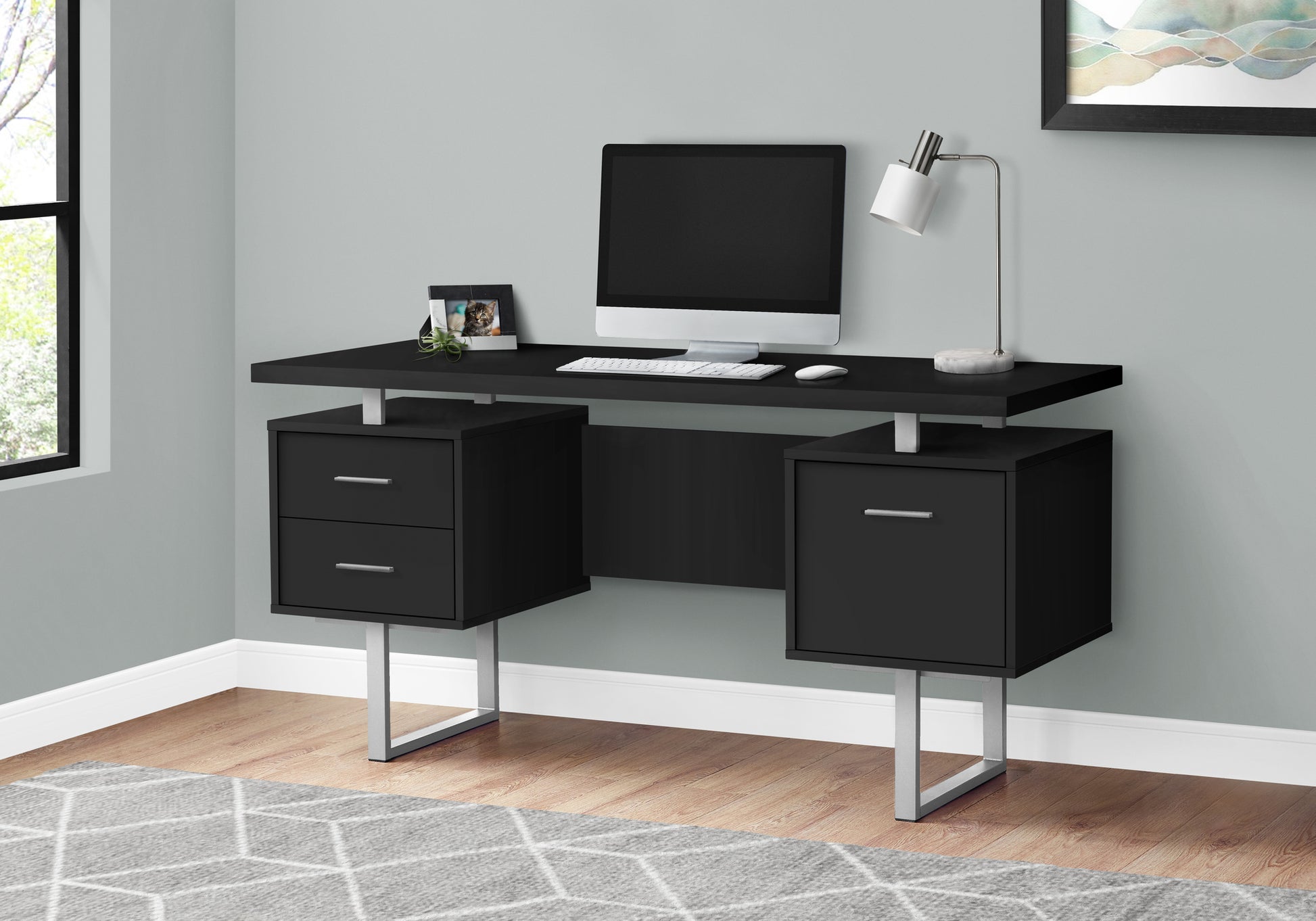 Black modern computer desk with silver metal legs and two drawers