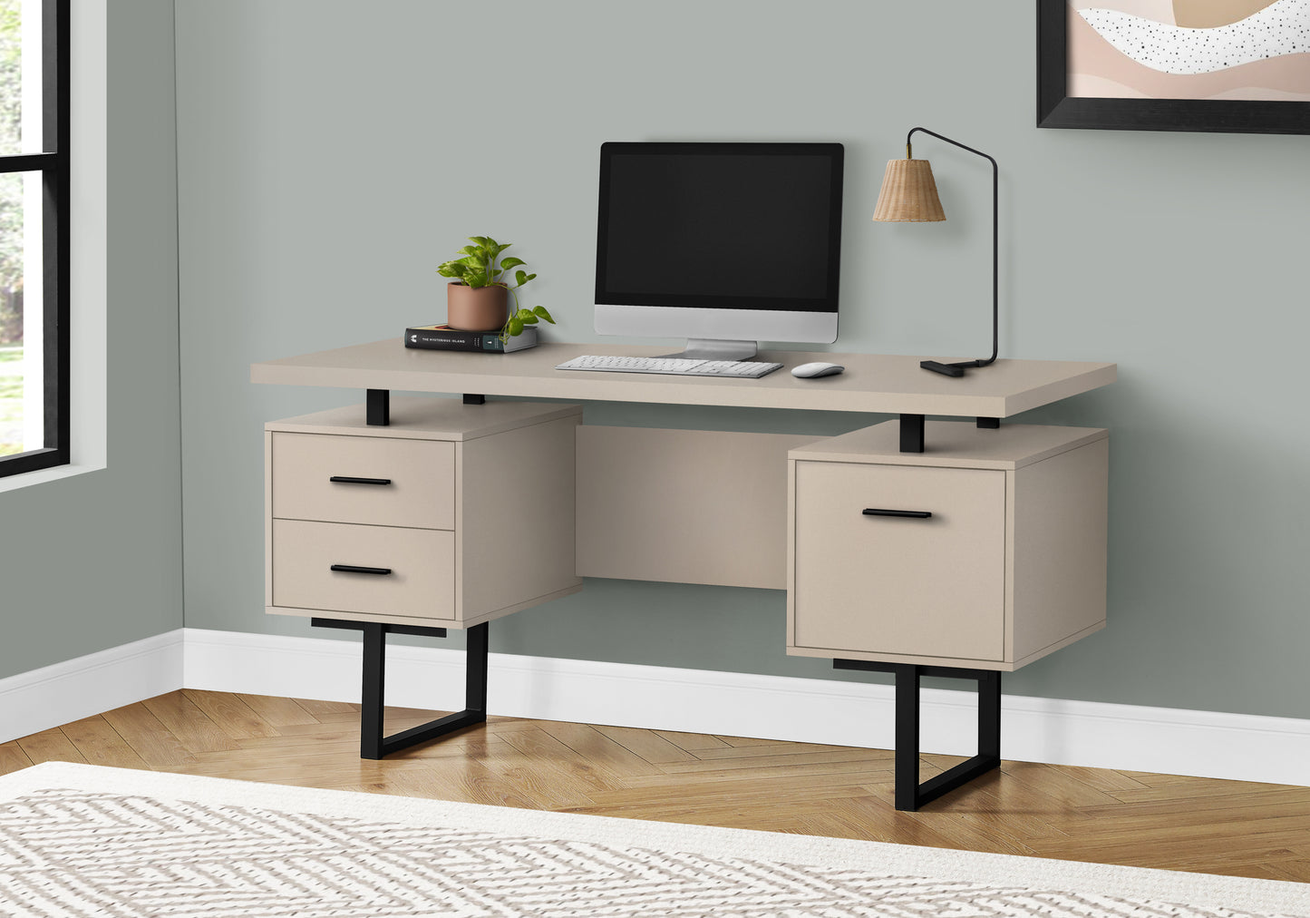 Modern beige desk with black legs computer and lamp