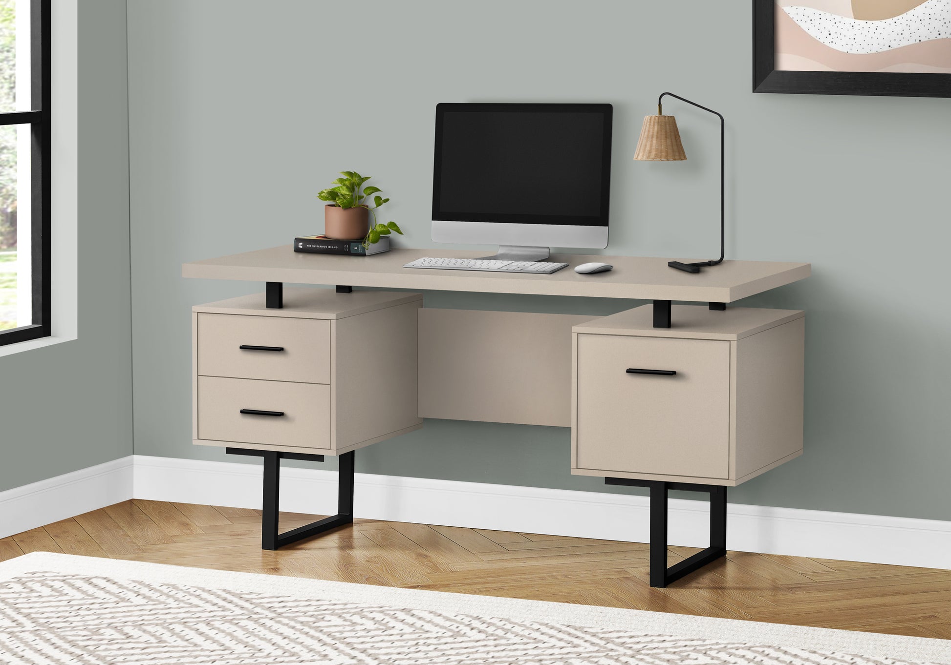 Modern beige desk with black legs computer and lamp