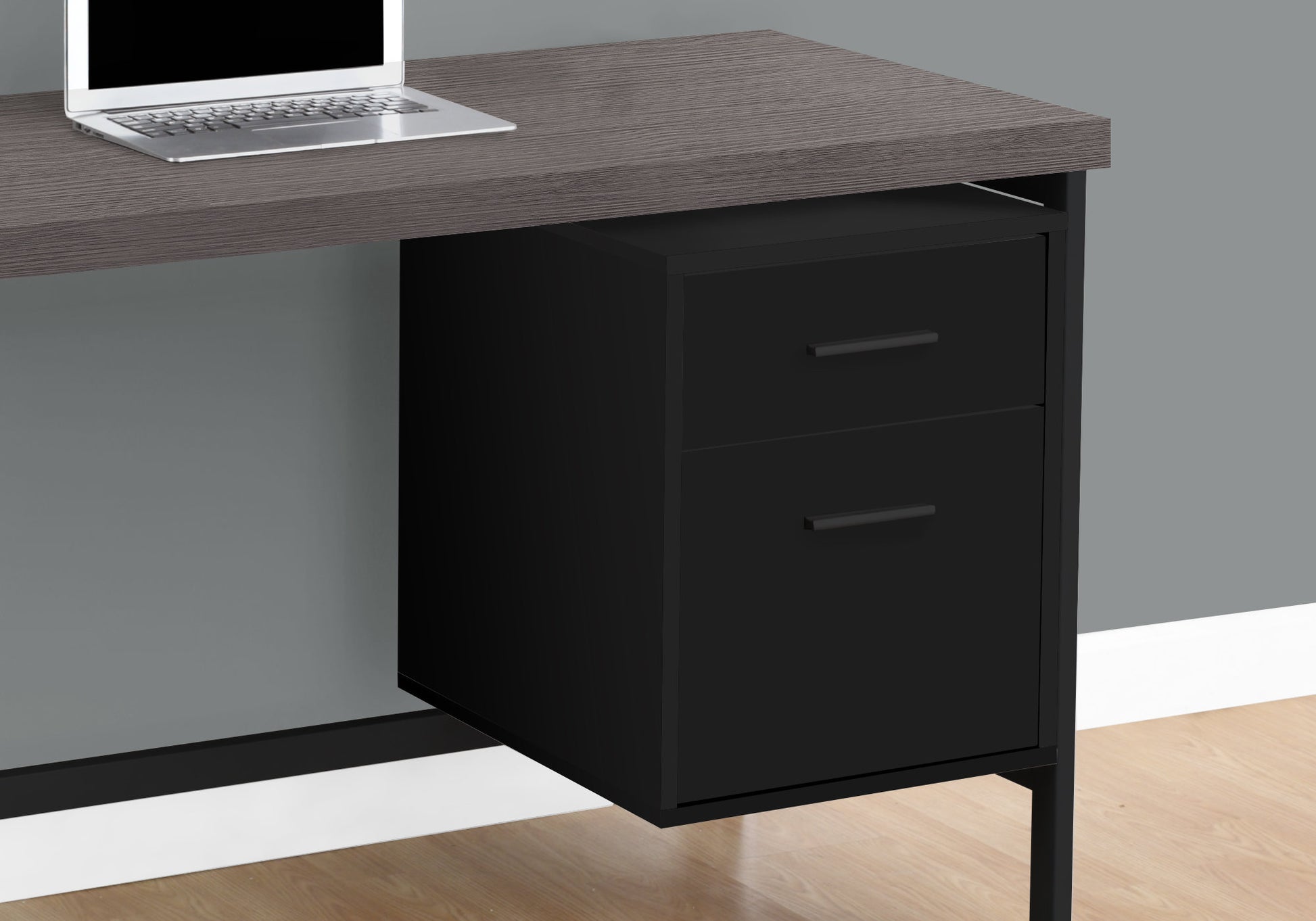 Modern desk with gray wood grain top and black filing cabinet with two drawers