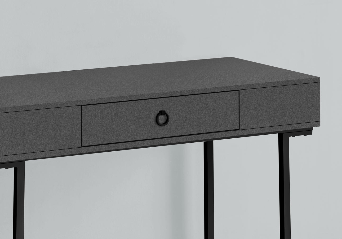Textured dark gray console table with single drawer and black ring pull minimalist design