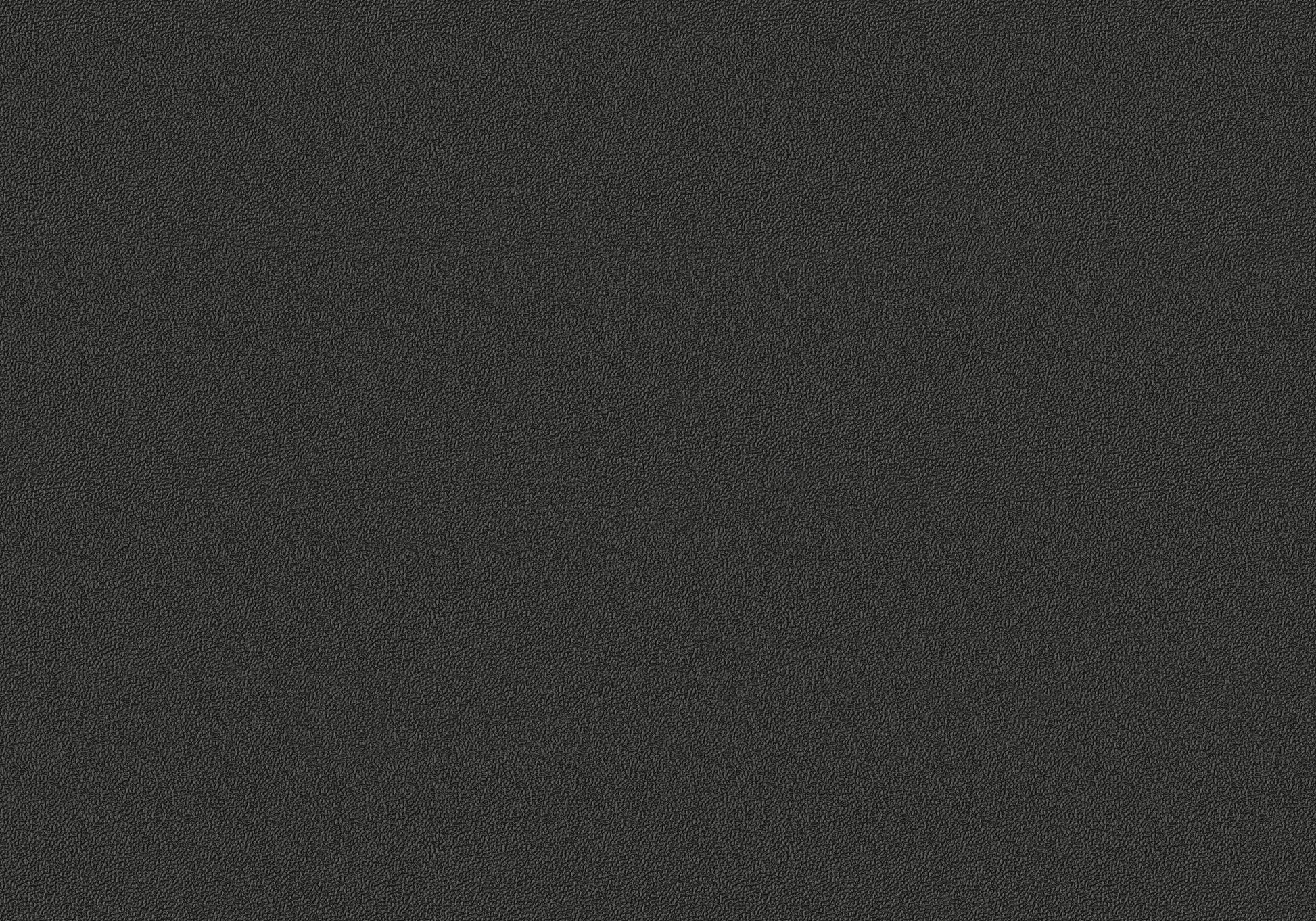 Closeup of a dark gray textured faux leather material sample