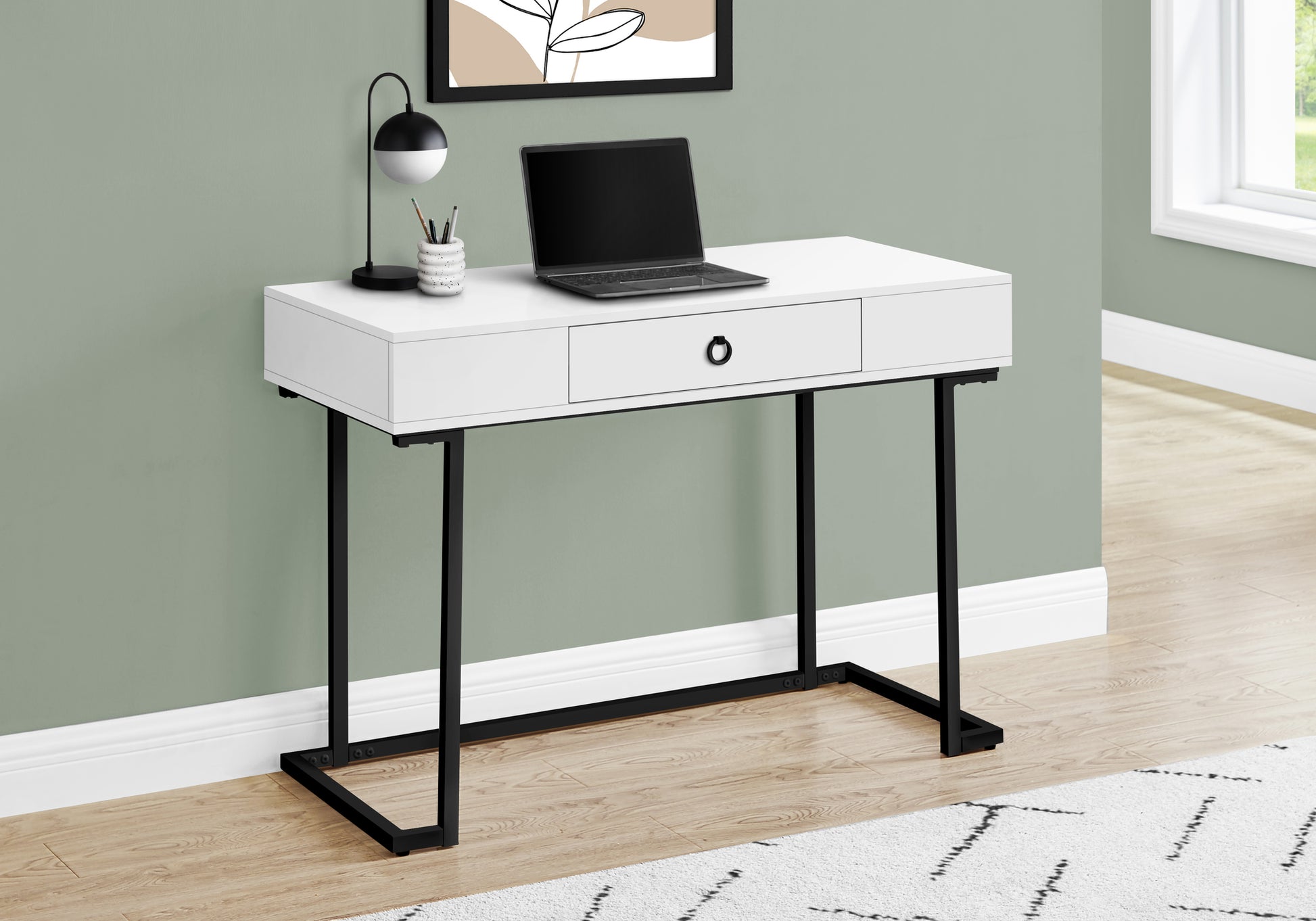 Modern white writing desk with one drawer and black metal legs laptop ready