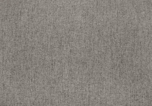 Closeup of grey textured upholstery fabric with a visible weave pattern