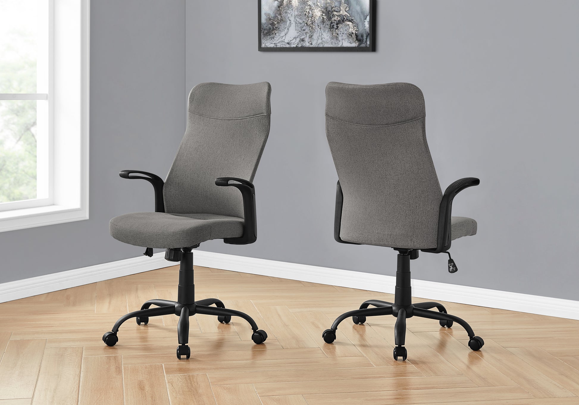 Gray fabric executive office chair with adjustable height and black casters ideal for home or office