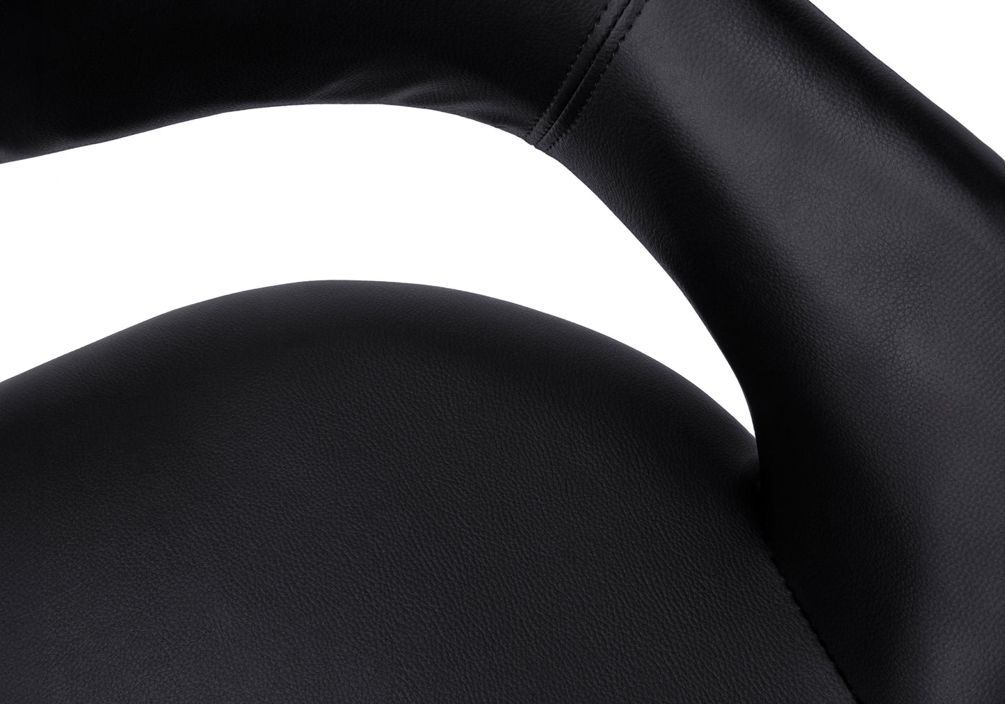 Closeup of black vegan leather chair armrest with visible stitching
