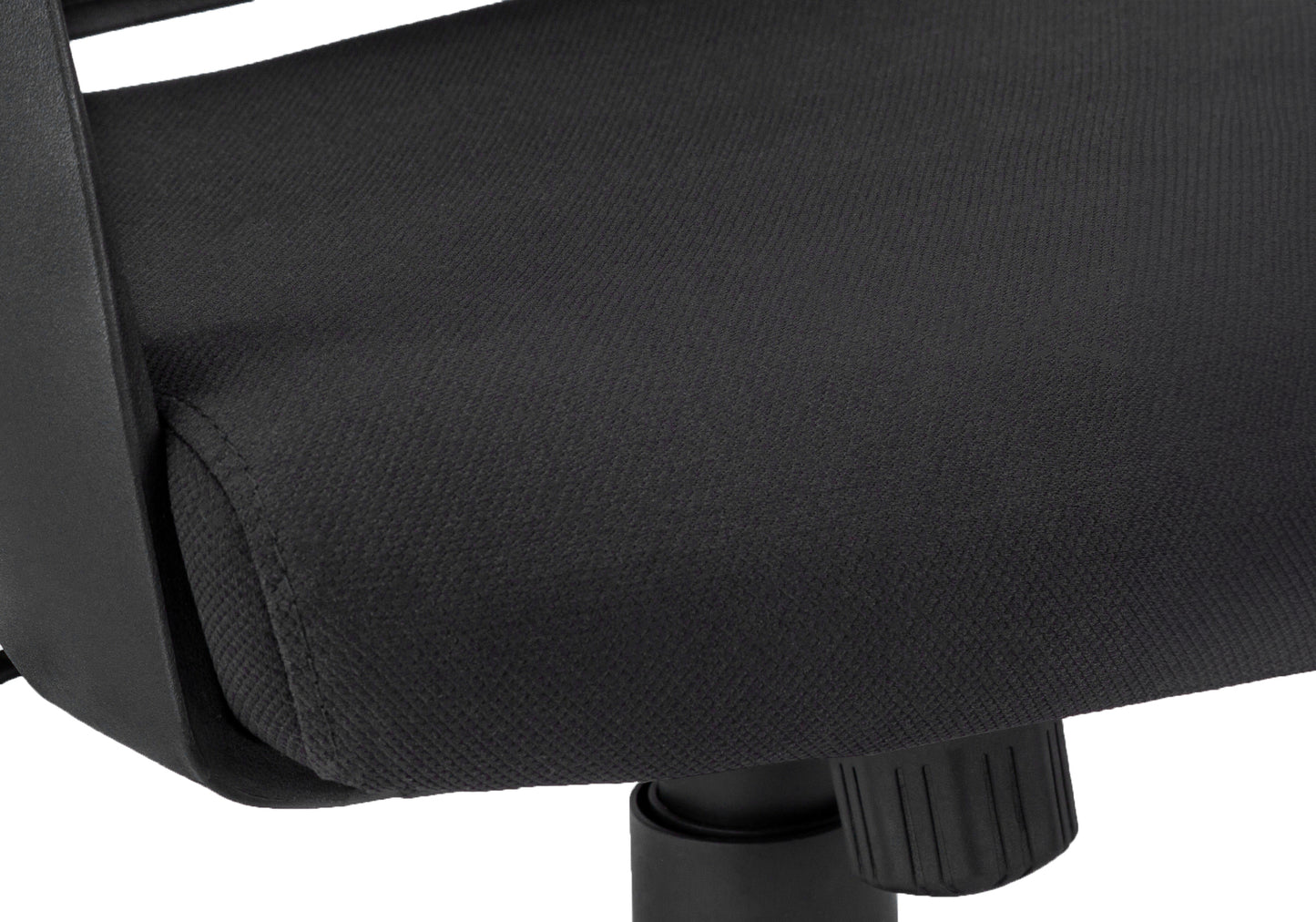 Closeup of a black fabric office chair seat with textured weave and black armrest support