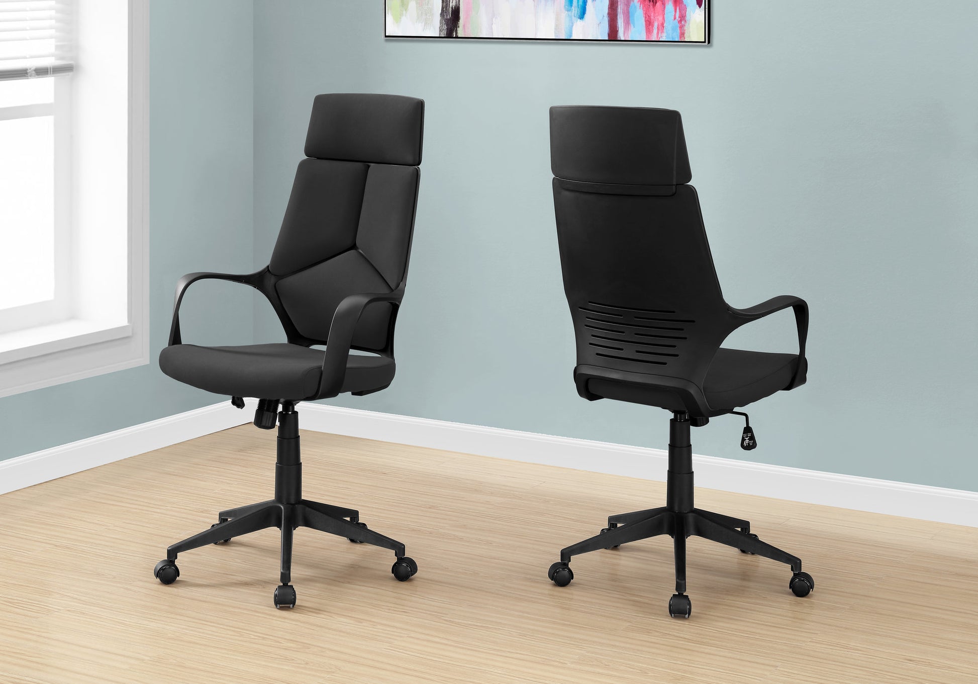 Black executive office chair with adjustable height and lumbar support