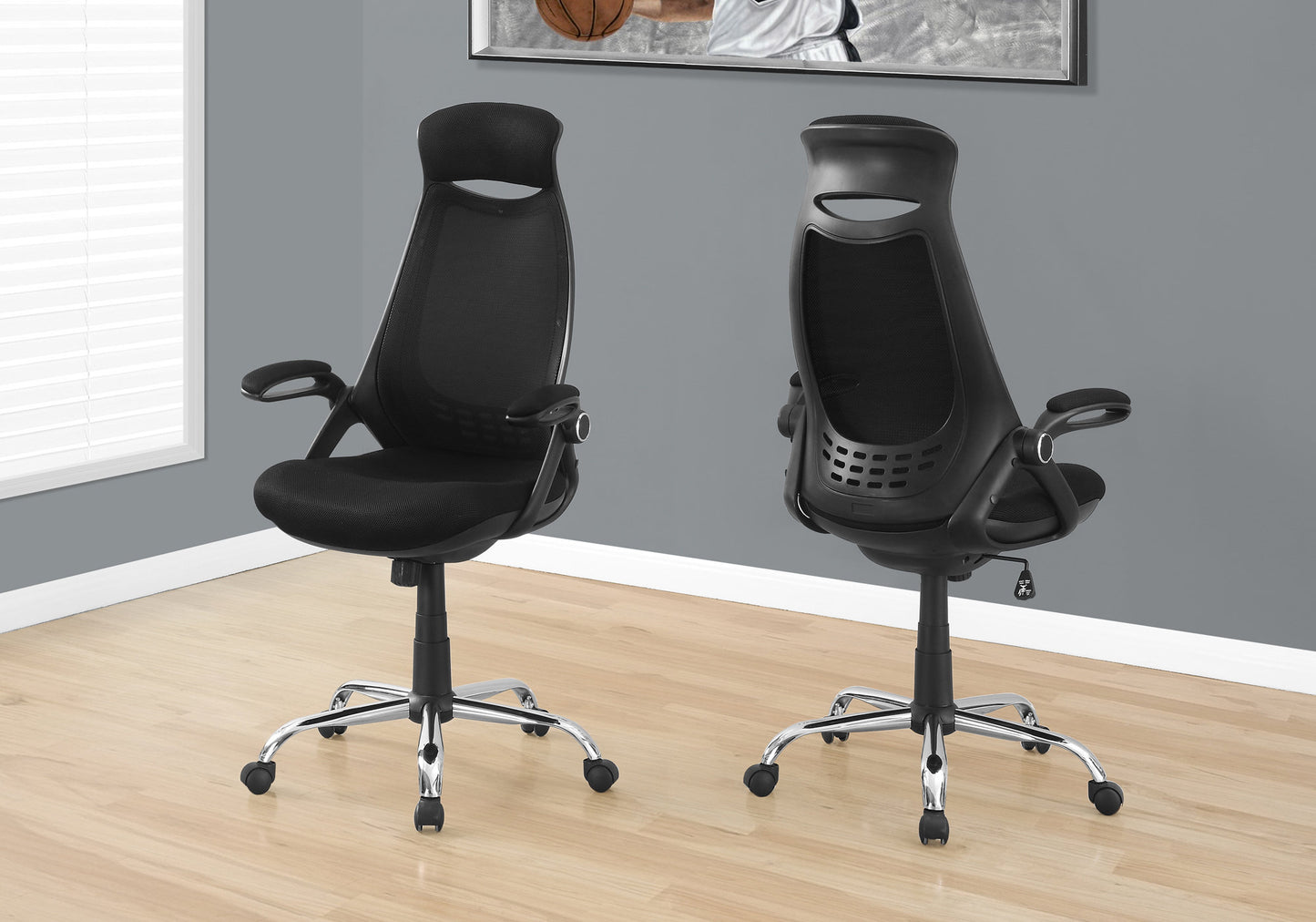 Black mesh ergonomic office chair front view with adjustable armrests