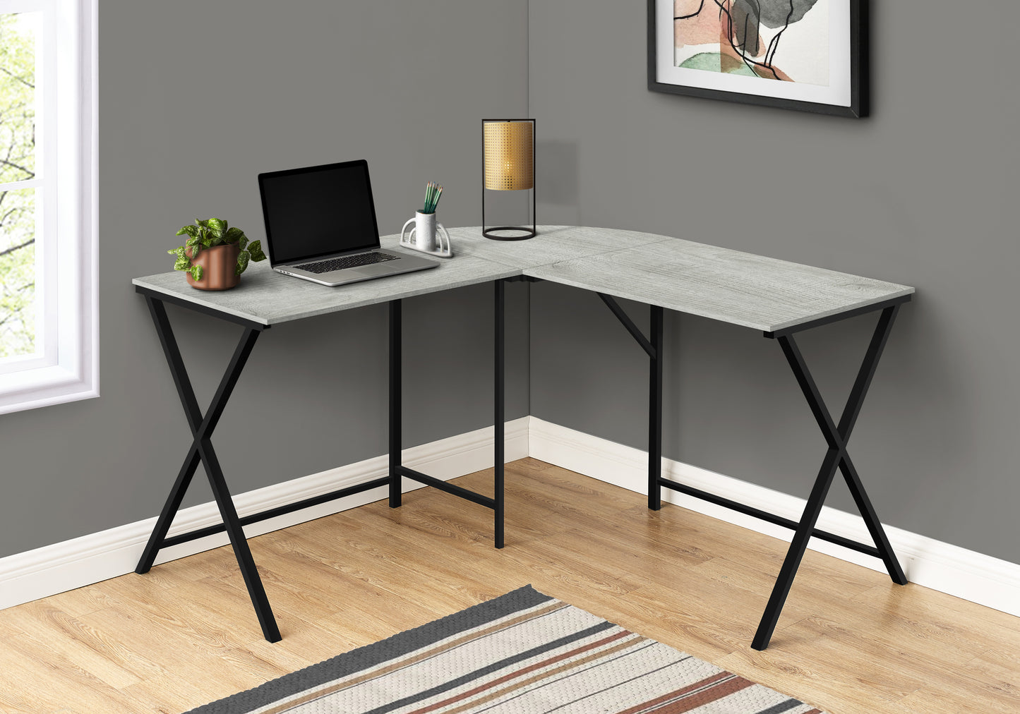 Modern grey wood grain Lshaped desk with black metal Xframe legs ideal for home office use