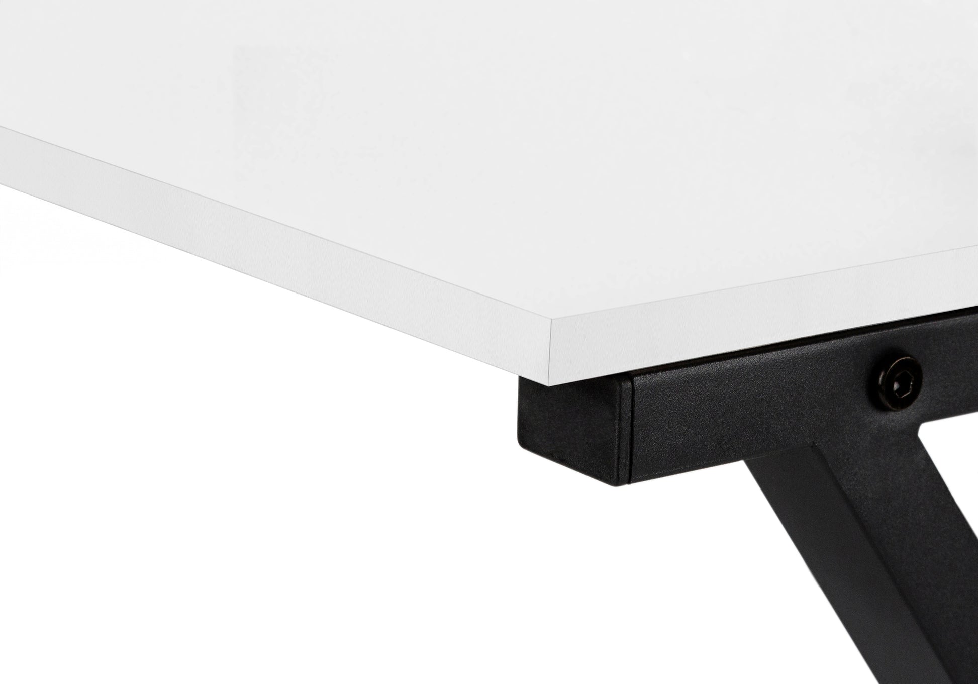 Closeup of a white desktop surface with a black metal frame attachment ideal for a home office desk