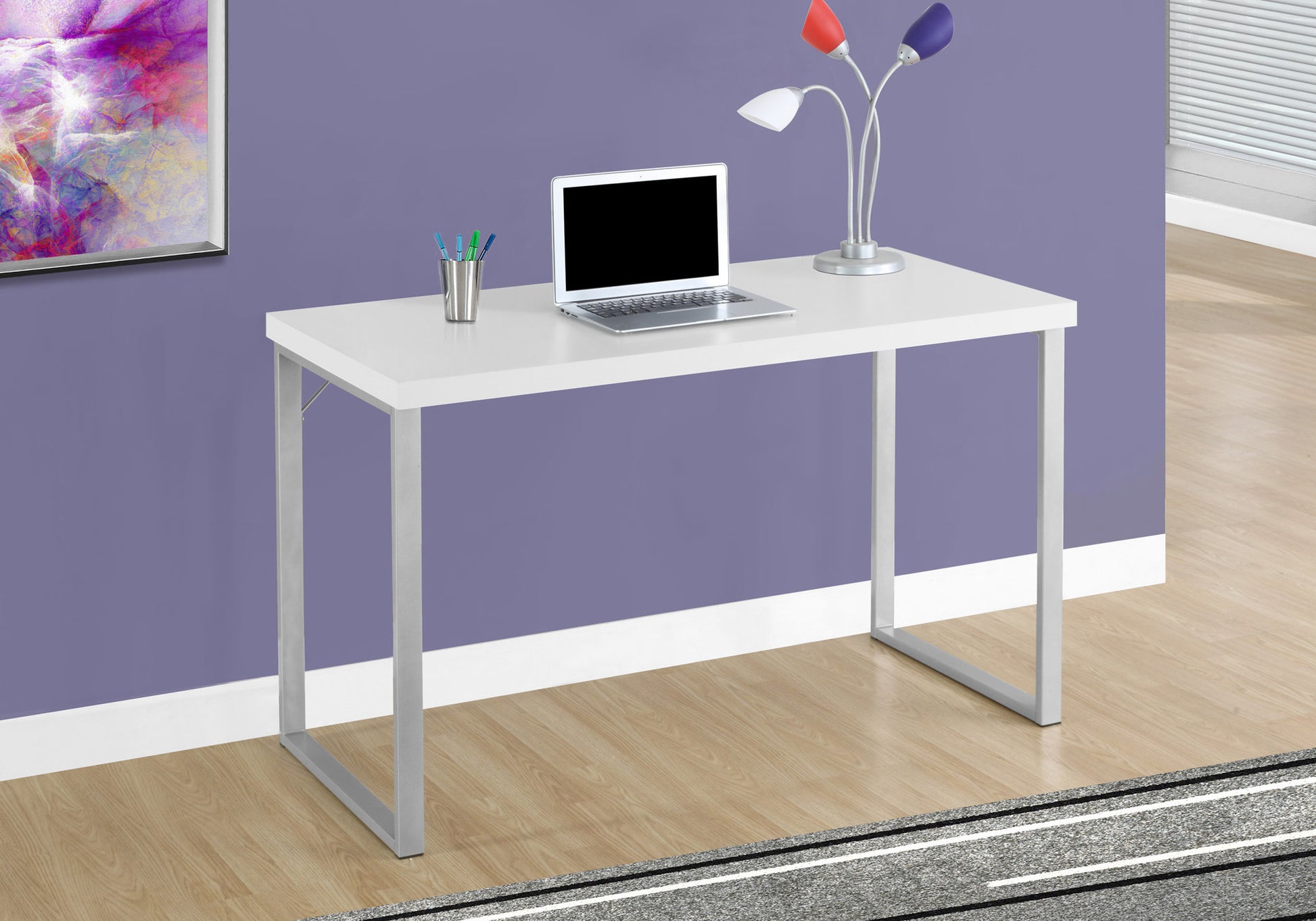 Modern white writing desk with silver metal legs perfect for home office setup