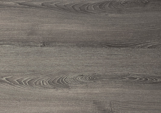 Dark grey weathered wood grain laminate flooring with visible texture