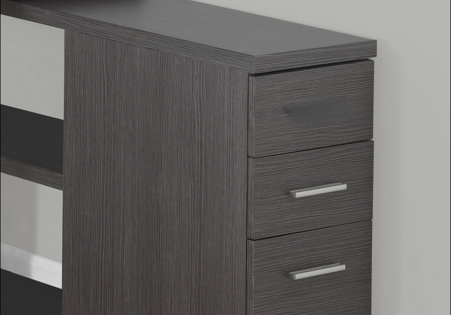 Dark grey modern bookshelf with three drawers and silver hardware