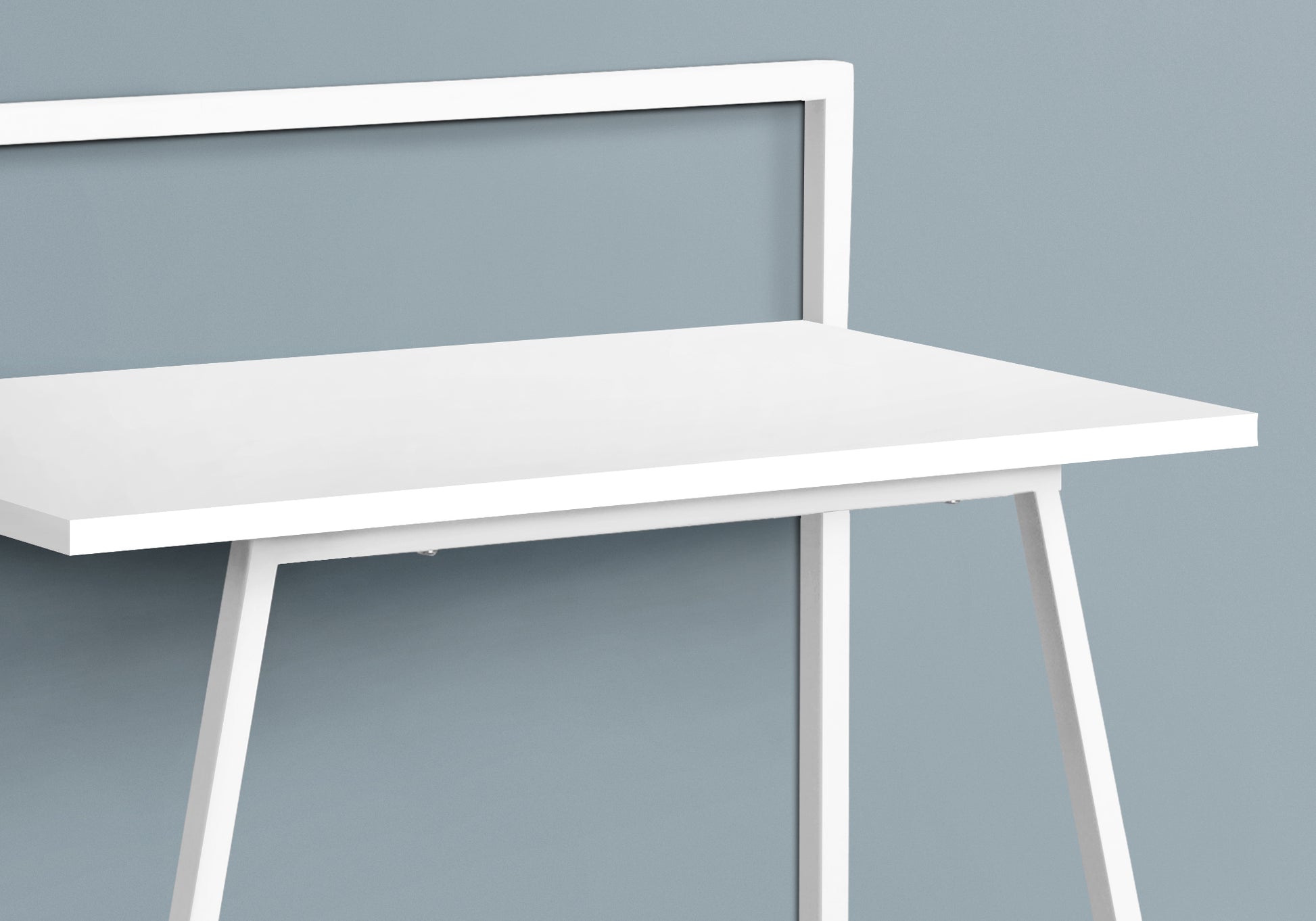 Minimalist white desk with clean lines and a slender frame for modern interiors