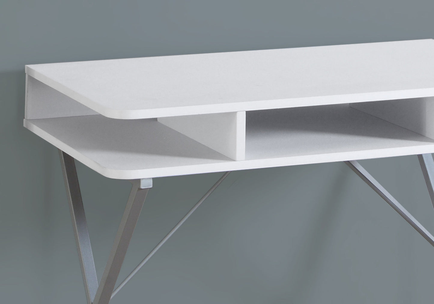 White modern desk with metal legs and open shelving unit