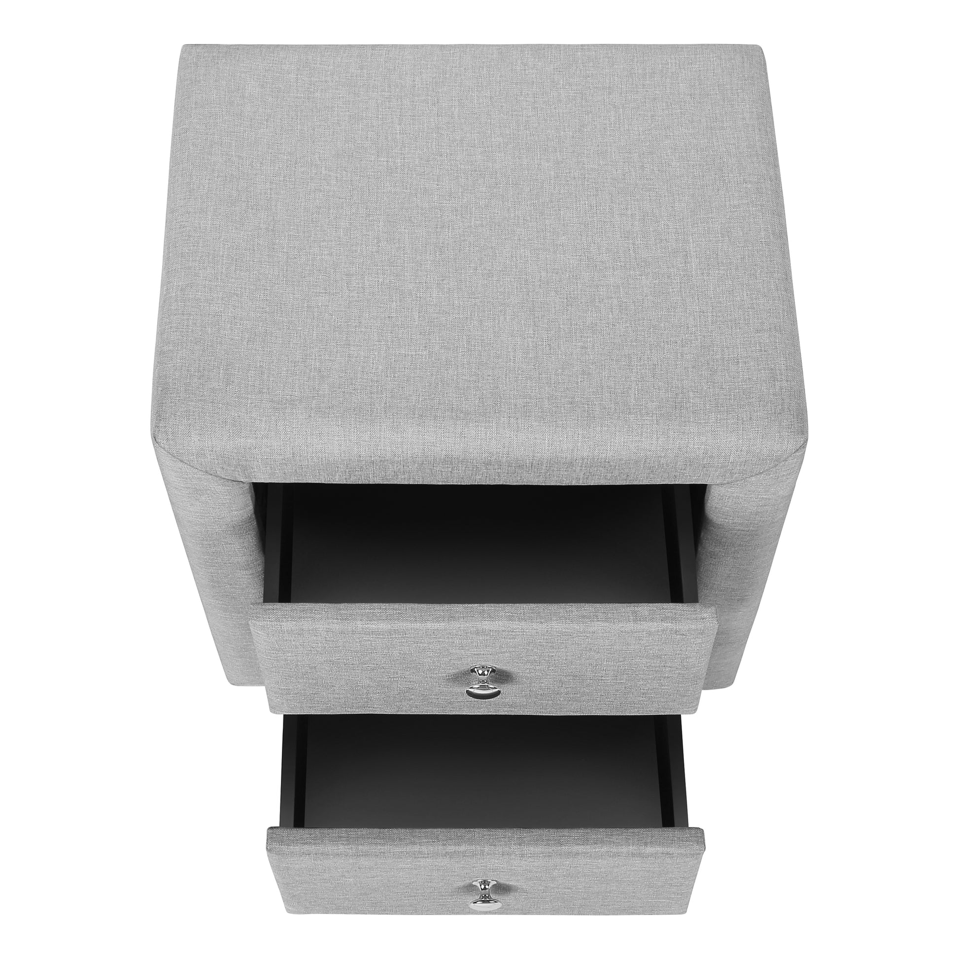 Gray upholstered nightstand with two drawers and silver knobs