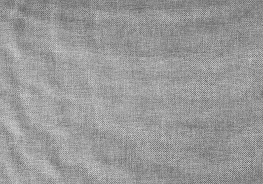 Closeup of a grey woven textured fabric for upholstery and home decor