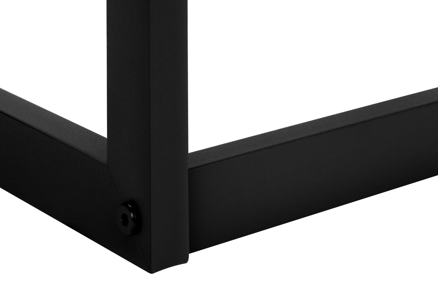 Detail of black metal table legs showing corner joint and bolt