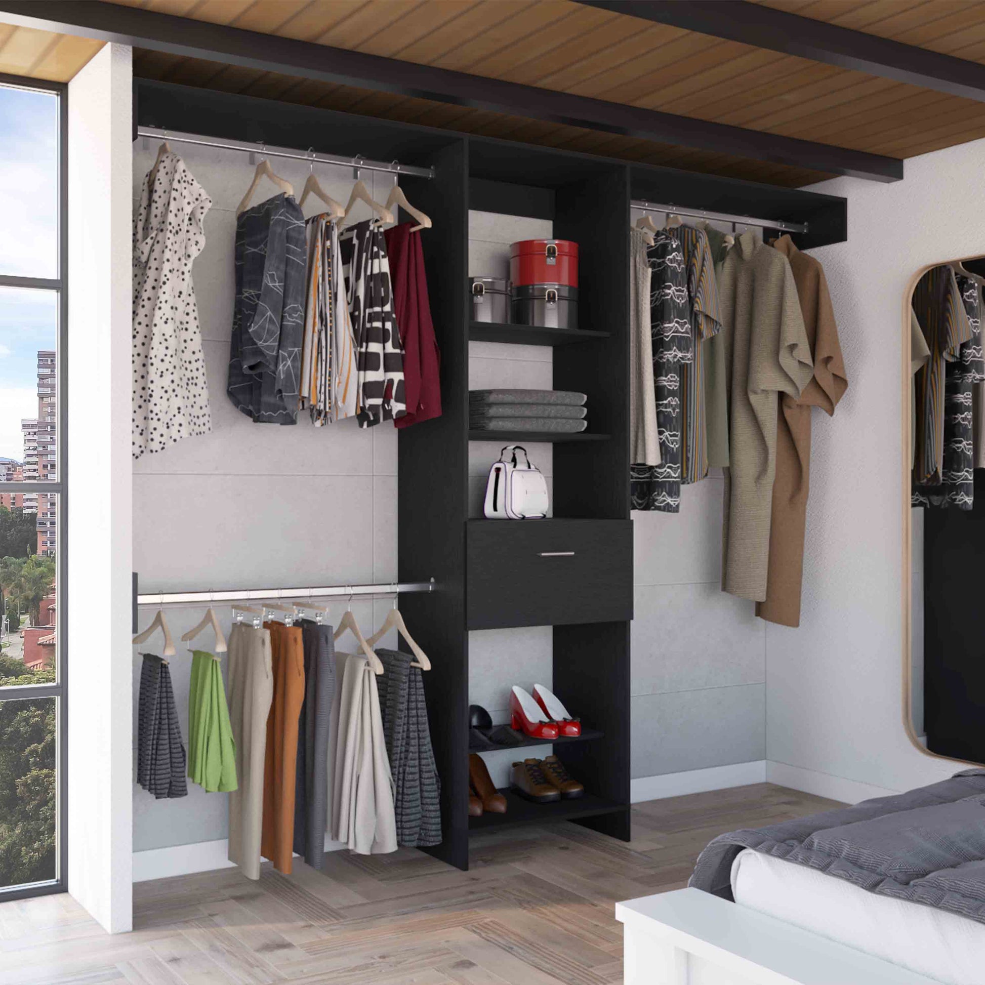 Black modern closet system with hanging clothes and shoes