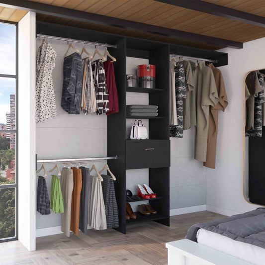 Black modern closet system with hanging clothes and shoes