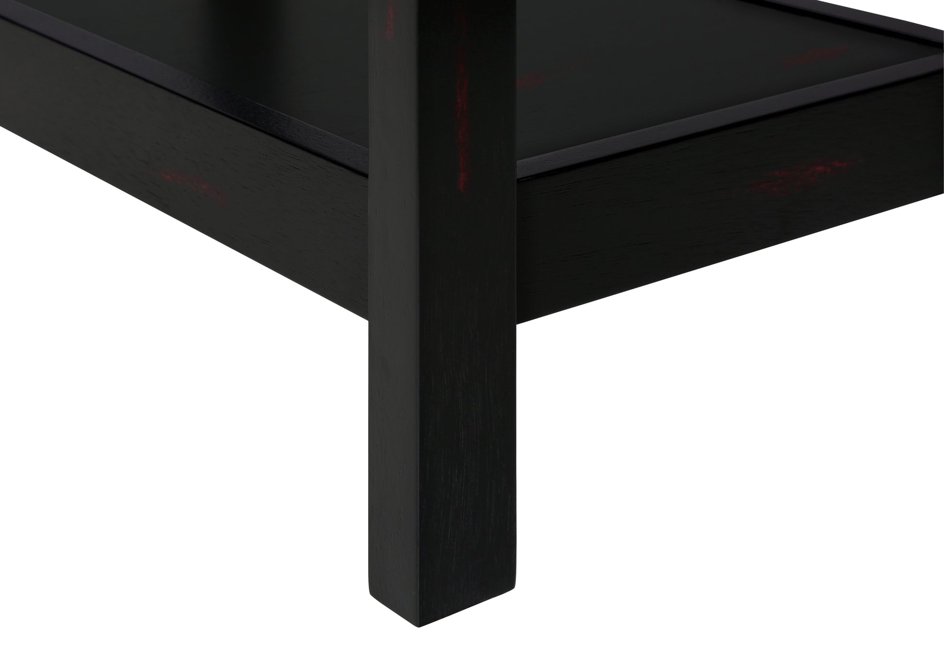 Black wooden side table leg with subtle red distressed accents