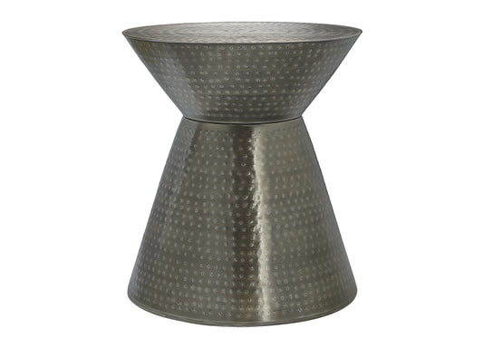 Hammered silver hourglass accent table with textured surface