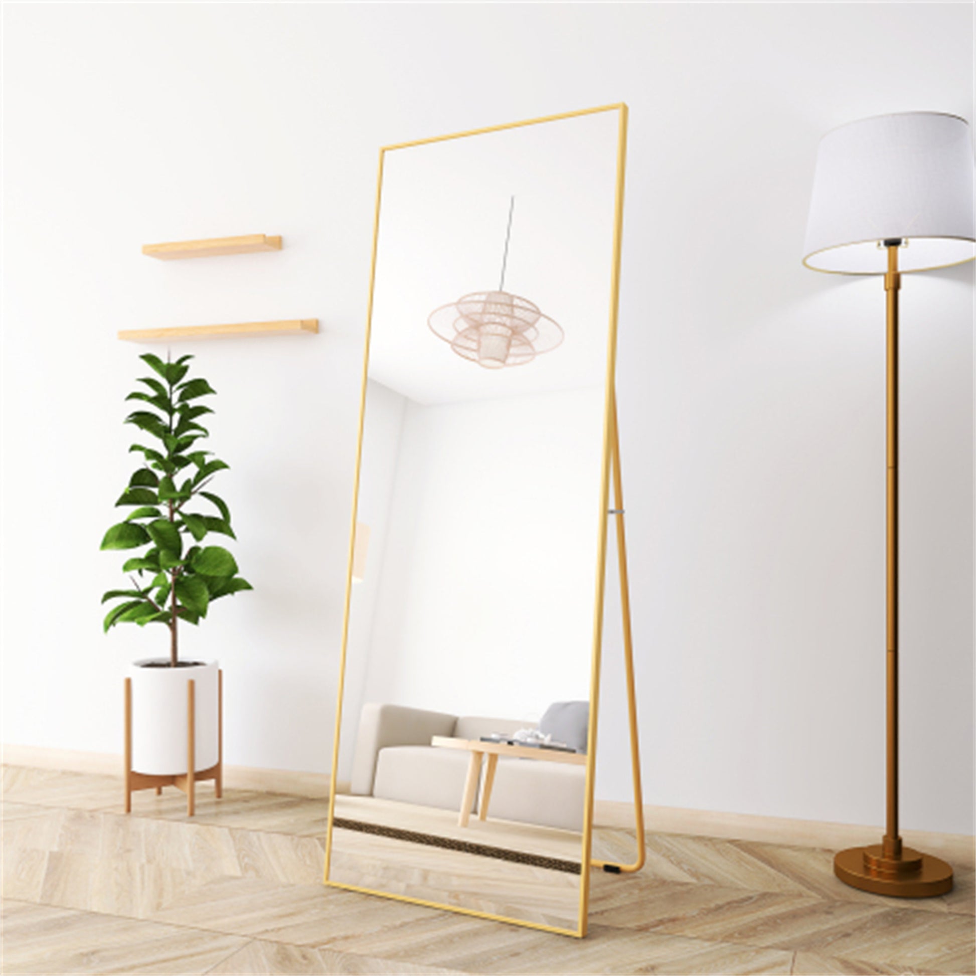 Fulllength gold framed standing mirror with sleek modern design