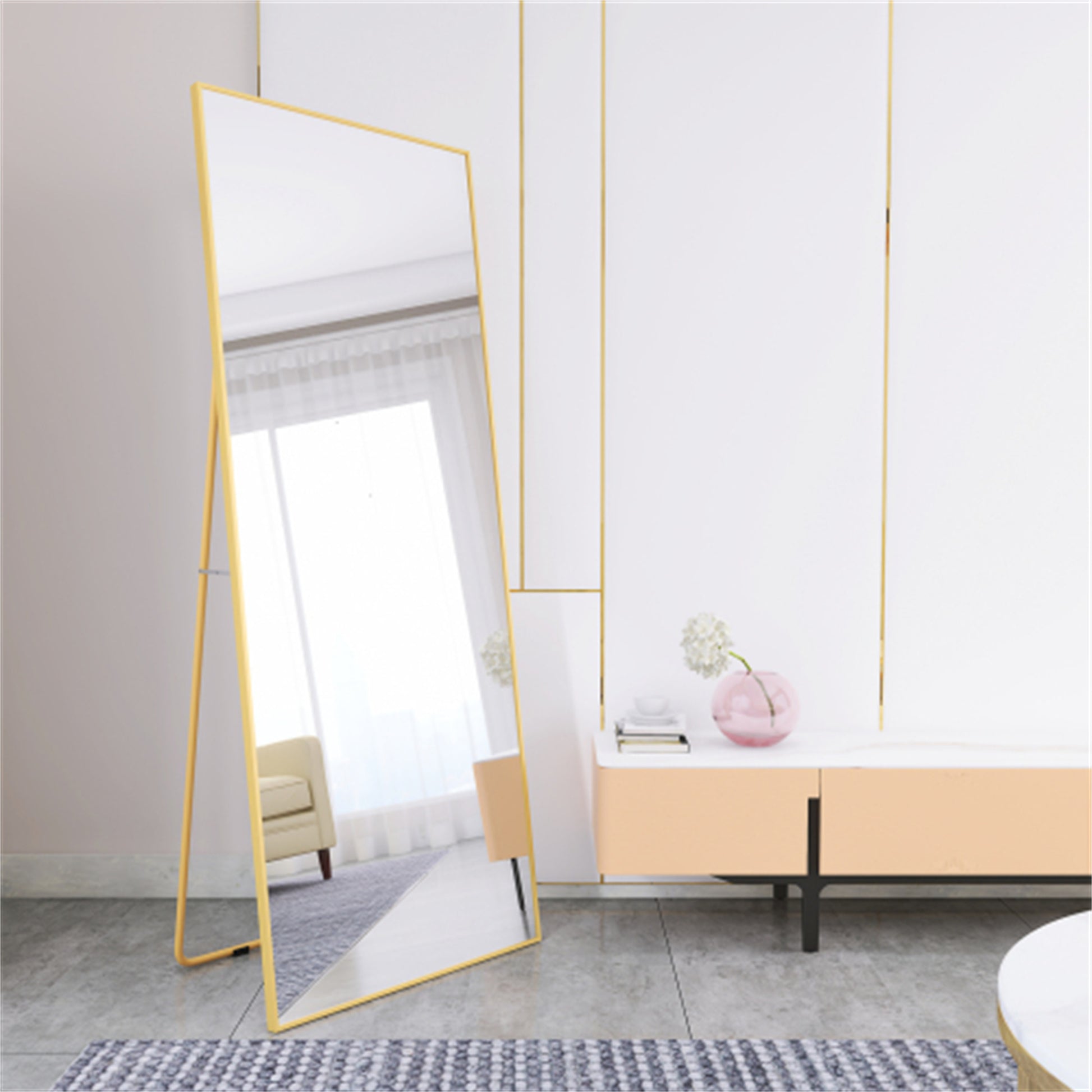 Tall gold floor mirror with slender legs