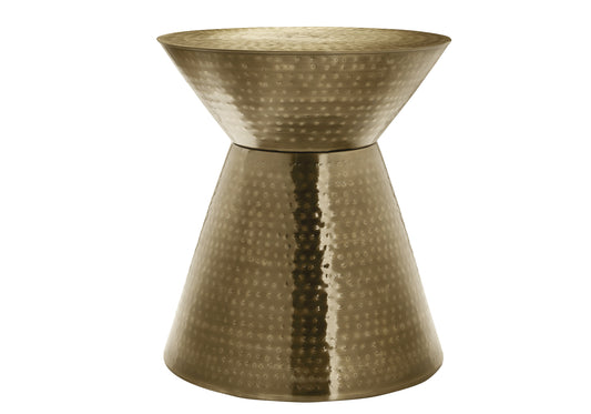 Hammered brass accent table with hourglass shape and textured finish