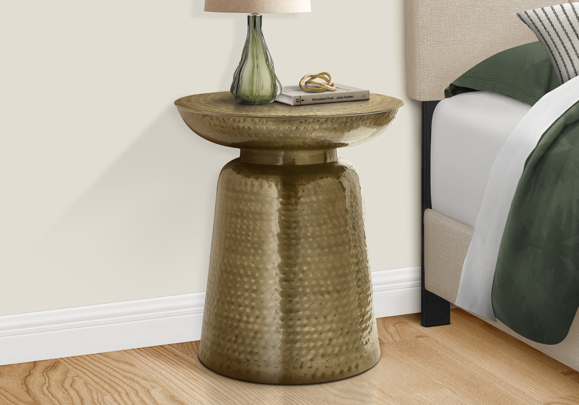 Antique brass hammered accent table with decorative top perfect for a side table